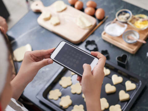 Woman Taking Photo Of Cookies 1048238330 1256x838