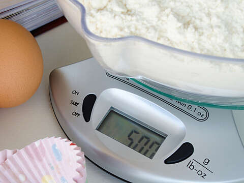 Weighing scale with baking ingredients square