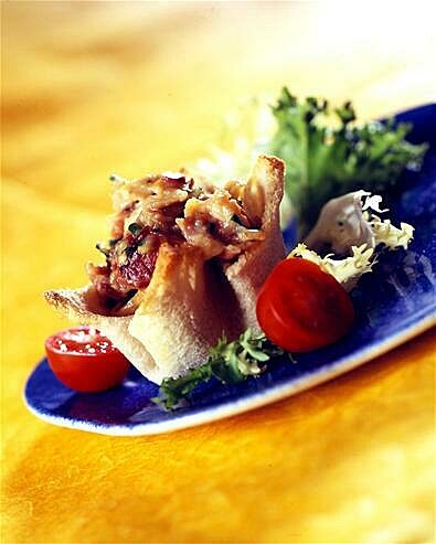 Scrambled egg and bacon baskets