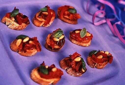 Roasted red pepper pinenut crostini